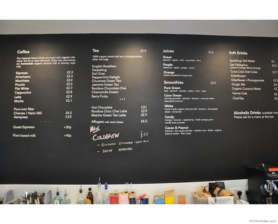 The impressive drinks menu is up above the counter...