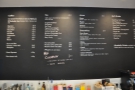 The impressive drinks menu is up above the counter...