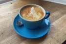 My flat white with some excellent latte art...