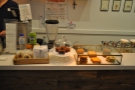 The middle part of the counter is kept free for cakes and the till.