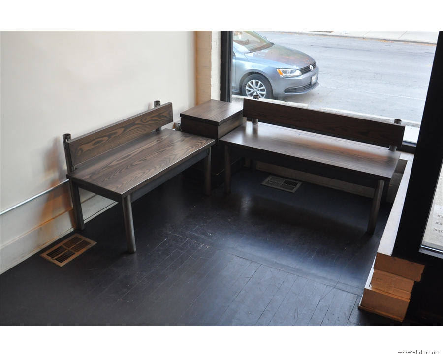 ... and, in the window, these benches. There's a coffee table in the other window.