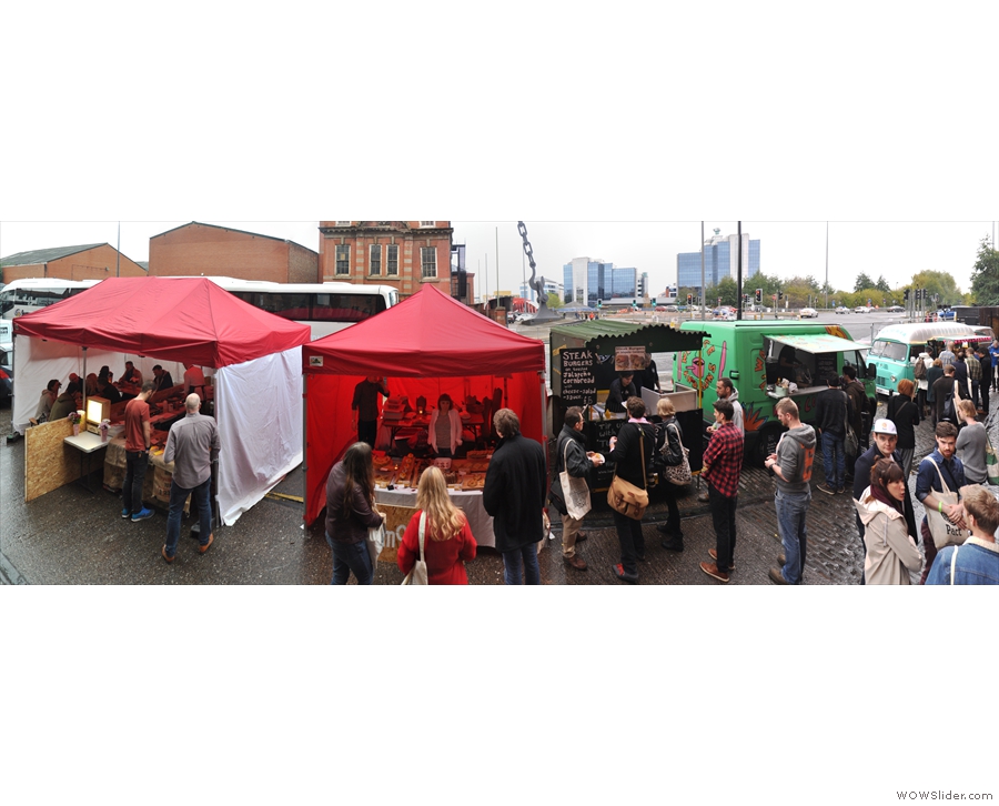 Finally, there was the street food area outside, doing great business despite the rain!
