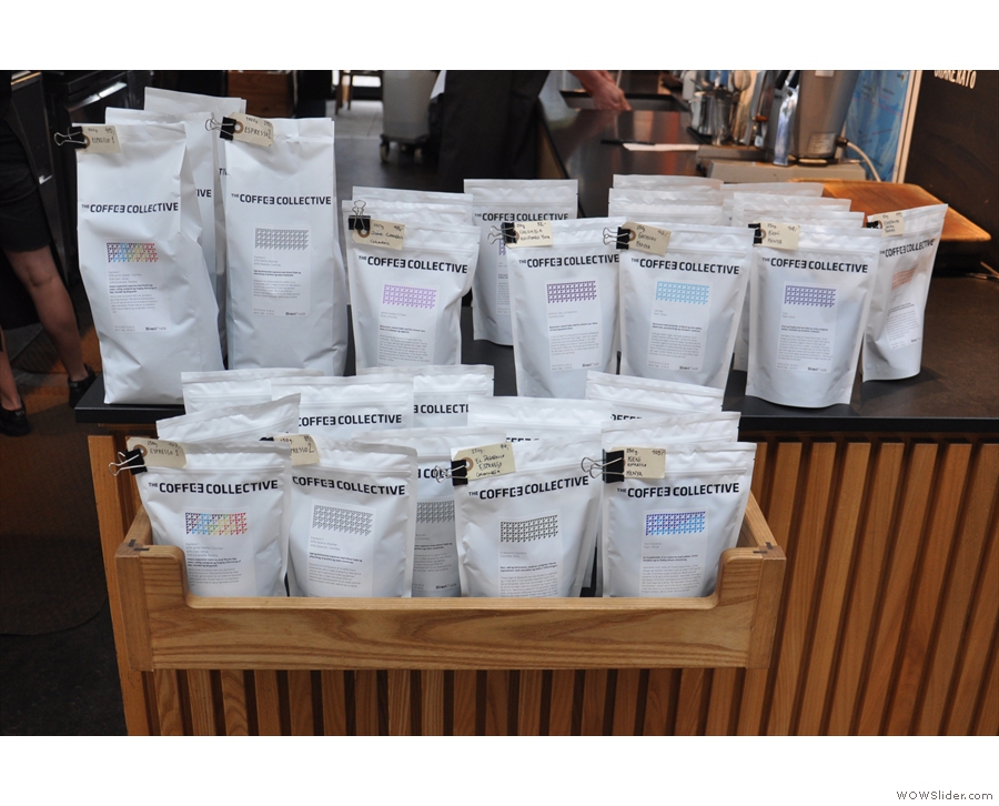 ... next to various bags of coffee for sale.