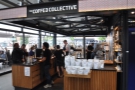 If you're coming from the northern entrance, the Coffee Collective is on the right...