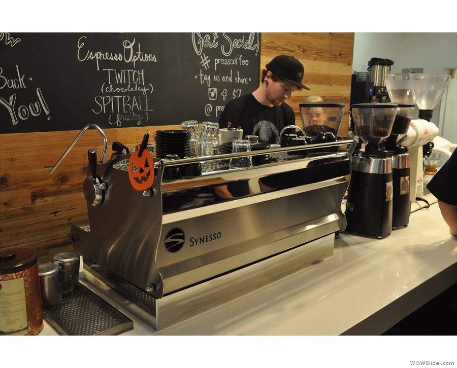 The counter is large and uncluttered. The Synesso espresso machine comes first...