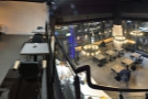 A panorama from the top of the stairs, mezzanine to the left, downstairs on the right.