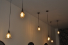 ... while these bulbs hang over the tables on the left.