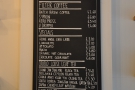The drinks menu is chalked up on the blackboard behind the counter.