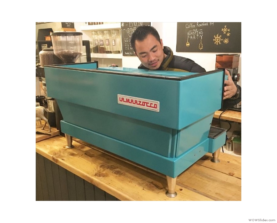 Not that it looks like this any more. Just four days after my visit, a new espresso machine arrived with a custom paint job! Photo by Coffee Lab, with owner Dhan giving it a hug.