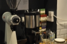 At the back, beyond the counter, is the EK-43 grinder and bulk-brewer for filter coffee.