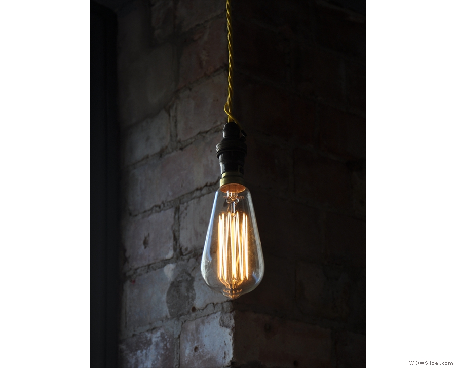 And finally, a single, bare bulb with a backdrop of exposed brick.