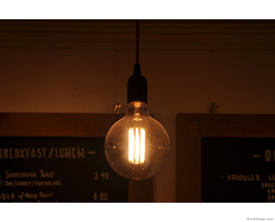 Hot Numbers mixes up the lighting like it mixes up the seating, including this bare bulb.