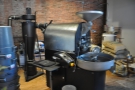 Roasting in the back of the coffee shop in Seattle, it's Elm Coffee Roasters.