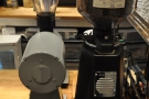 There are a pair of grinders, filter on the left, espresso on the right...