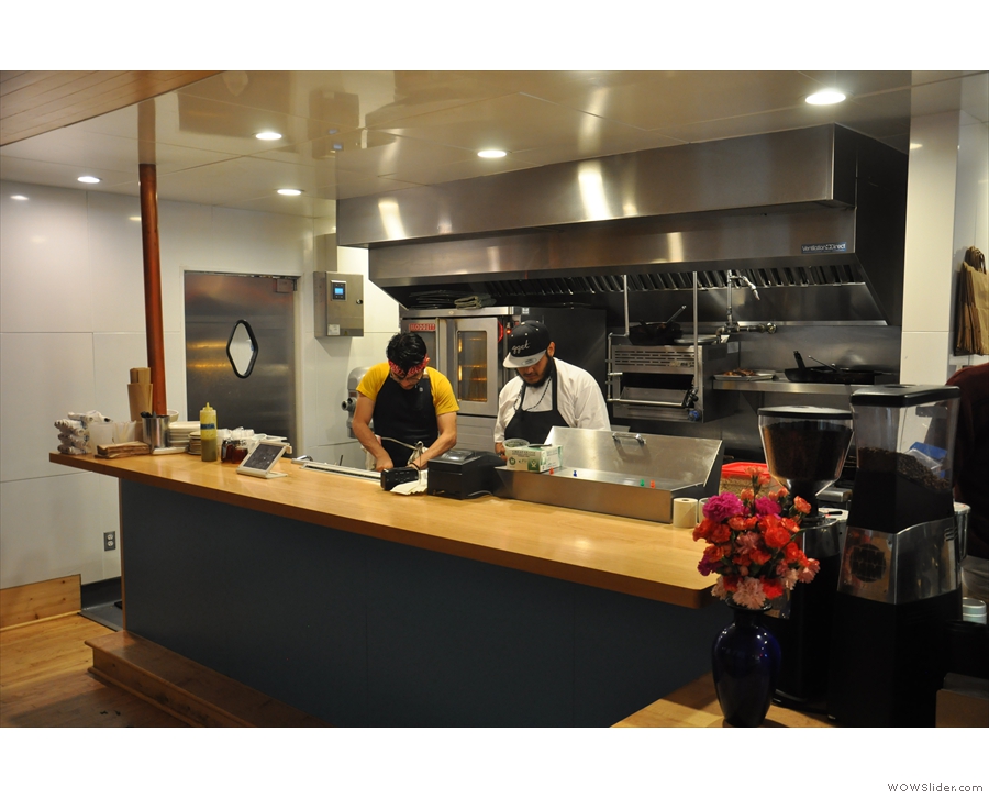At the back, on the right, is the food part of the operation, with this open-plan kitchen.