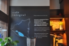Café Integral's mission statement is written up on the wall by the window.