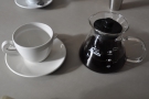 My coffee, served as it should be, in a carafe with a cup on the side.