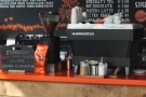 The choices, one single-origin on espresso, another on filter, are chalked up on the counter.