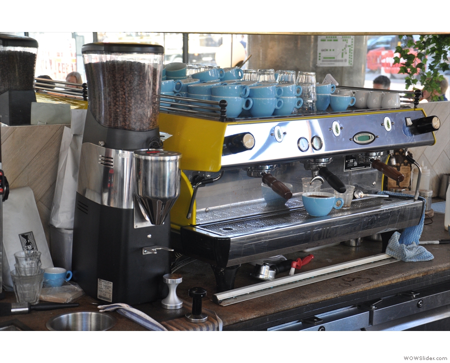 There's a three-group, yellow La Marzocco inside. Although you can't easily see its colour.