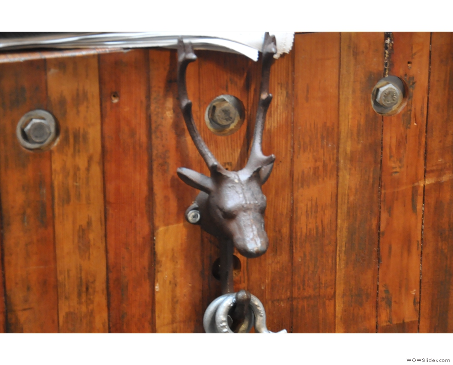 This neat stag's head is a hook for a chain, designed to close off access to the roastery.
