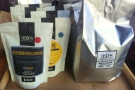 You can also buy retail bags of the coffee (left) while the coffee in the hopper's on the right.