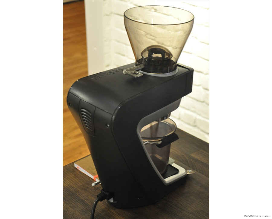 The beans are pre-weighed in small, red boxes & ground on demand in the Baratza grinder.