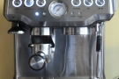 While it's grinding, the little light above the grinder flashes on and off.