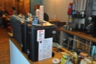 The coffee-end of the counter is towards the back, with bulk-brew filter on the back wall.