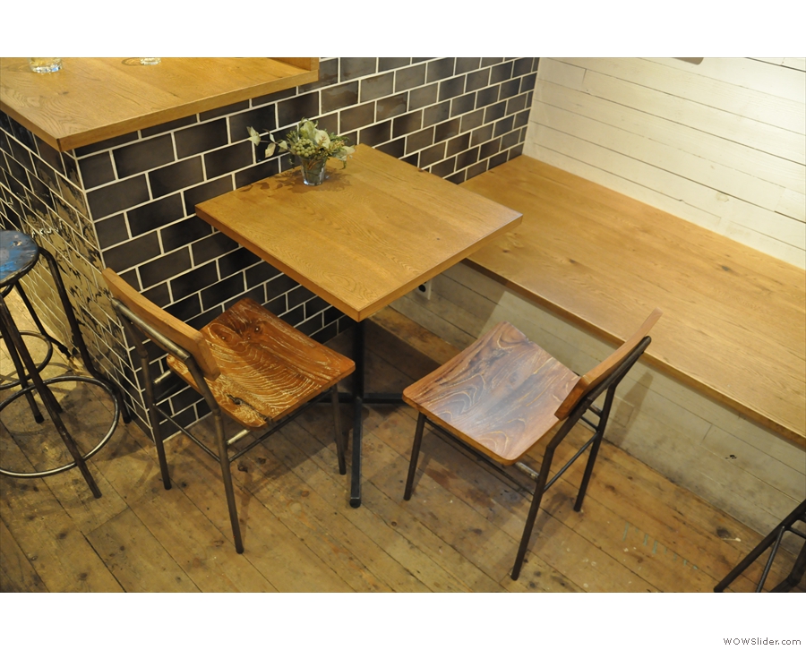 Alternatively, there's more seating beyond the counter, starting with this table on the left.