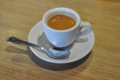 My espresso, bossing it in a classic white cup.