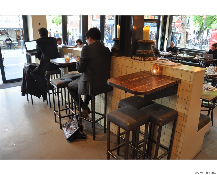 You can sit at the counter itself, or at one of these three high tables.