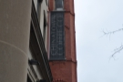 It's easy enough to miss, although there's this handy banner hanging higher up the building...