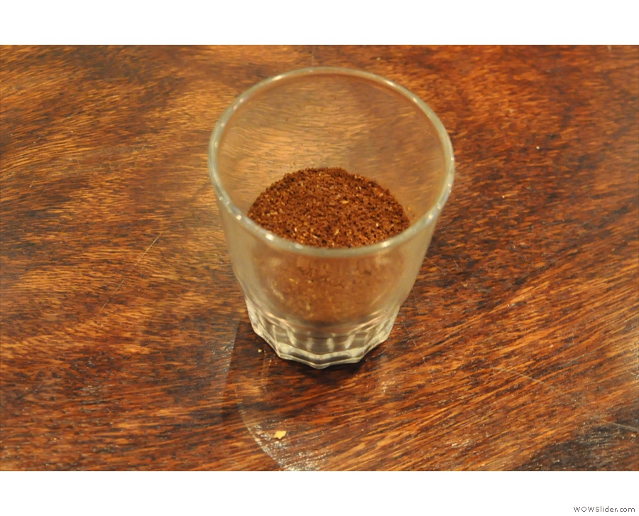 The ground coffee. I didn't ask the grind setting: slightly coarser than Aeropress, perhaps?