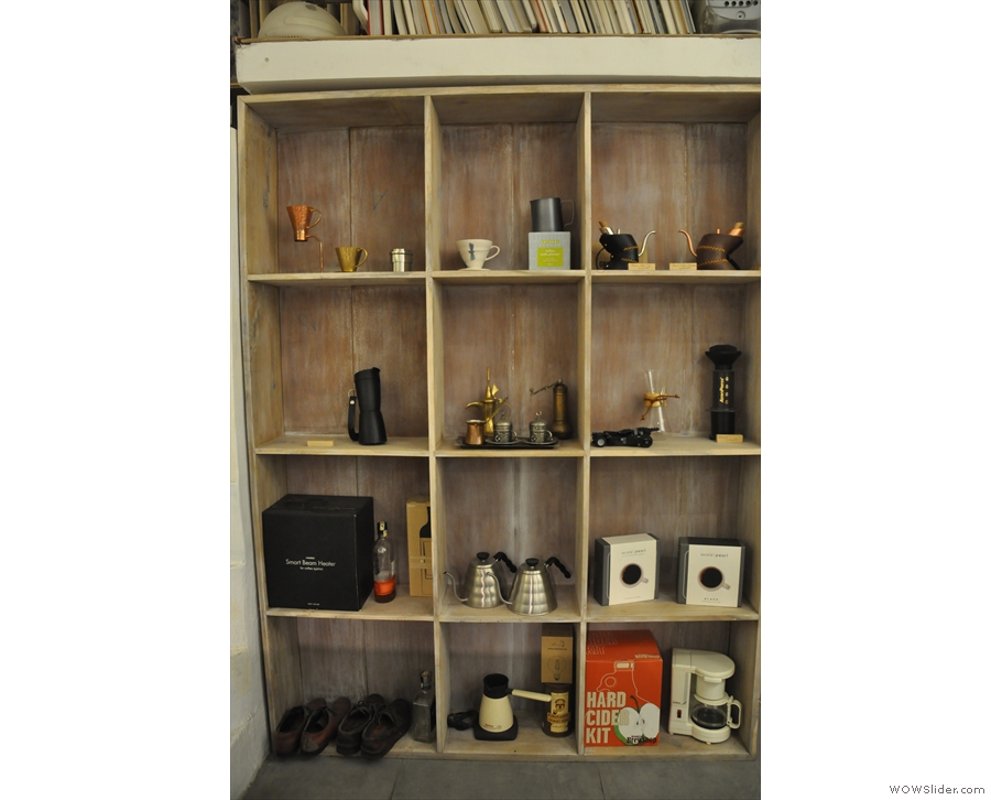 A display of coffee-making kit from the shelves at the back.