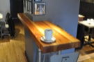 Everything else is tucked in beyond the counter and under the stairs. There's this table...