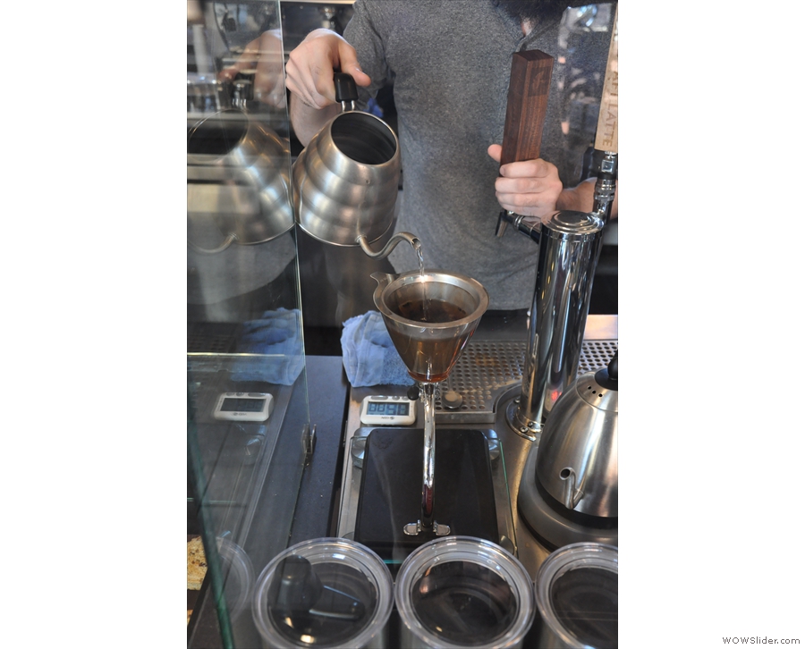 La Colombe uses the Silvertown dripper, seen here in action making my coffee.
