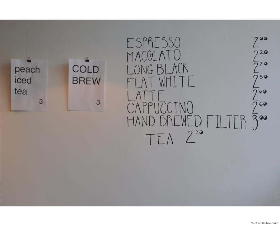 The coffee menu, which is commendably concise, is on the wal lbehind the counter.