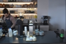 Filter coffee, mostly pour-over, is at the far end of the counter.