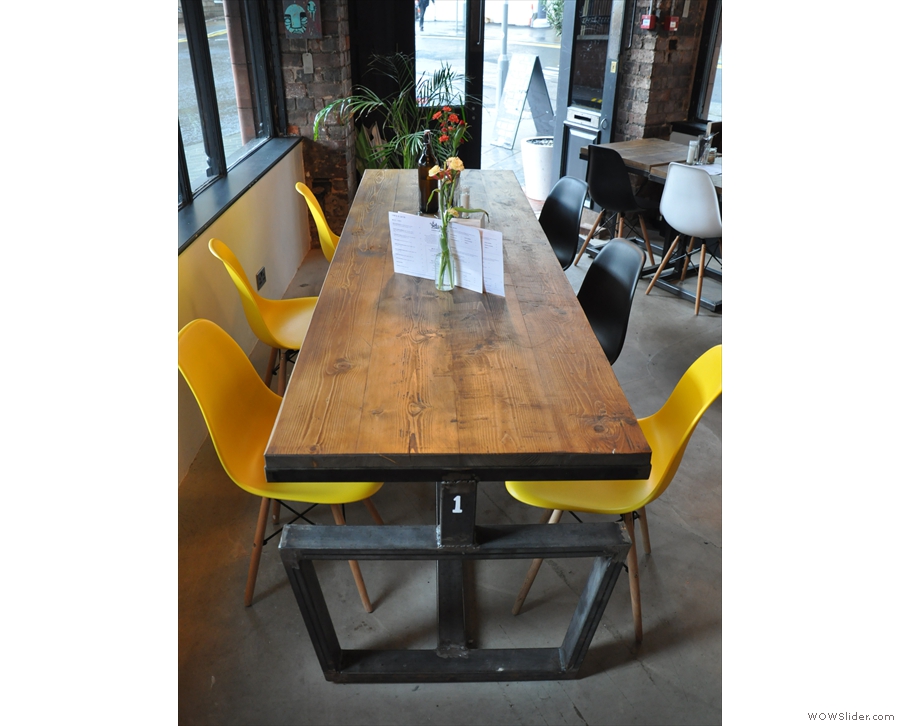 There's plenty of seating in the front, such as this communal table on the right...