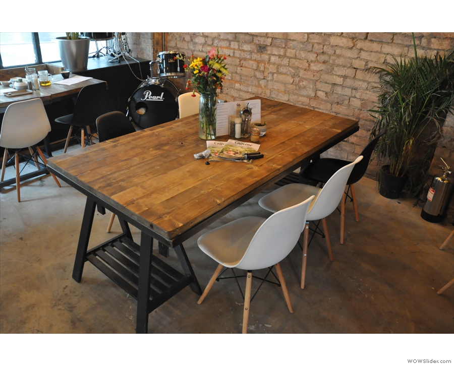... while this communal table occupies the centre of the space.