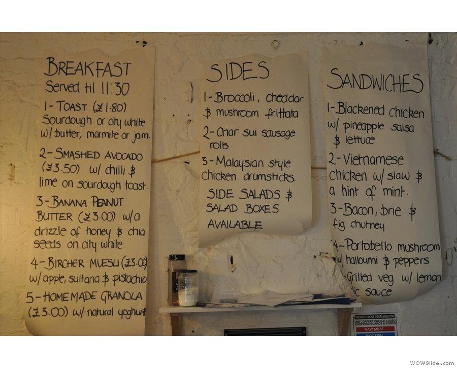 The menus are written up on the wall behind the counter...