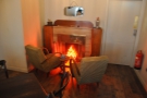 Right at the back is the trademark 200 Degrees neon fireplace with two armchairs...