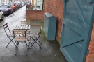 When not pouring with rain, the outside seating is a good option. There's a table here...