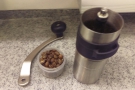 Pre-weighed beans, of course, plus my old ceramic-burr grinder.