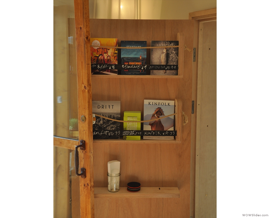 Meanwhile the back of the connecting door has been pressed into use as a magazine rack.