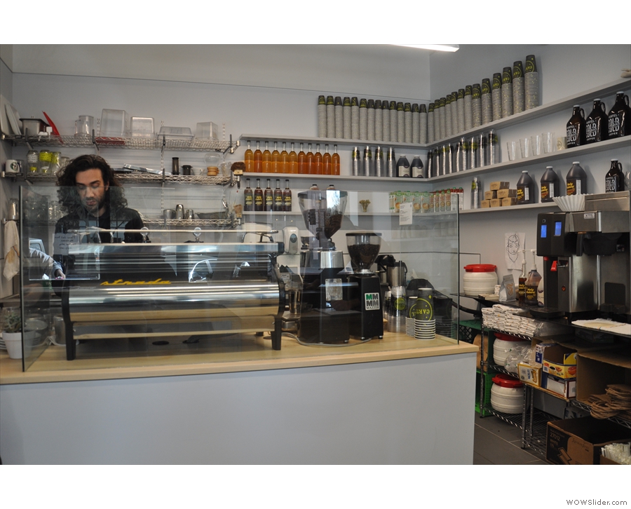 Finally, on the left, behind a perspex screen, is the Strada espresso machine & its grinders.