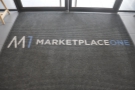 The doors lead into Marketplace One, home of co-working space, The Department.