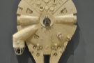 Of course, a Millenium Falcon hangs from the wall...