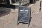 Wandering down on Canterbury's magnificent High Street, an A-board catches the eye.
