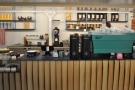 The espresso machine & its two grinders are off the right, with filter coffee at the back.